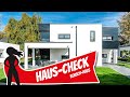 Traumhaus-Check: Moderne Stadtvilla San Diego mit Flachdach von Rensch-Haus | Hausbau Helden