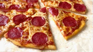 Homemade Pepperoni pizza on a thin dough recipe