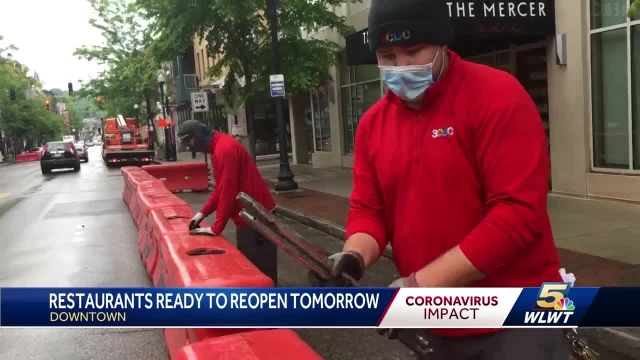 City puts up street barriers, opens up street seating as restaurants prepare to reopen Friday