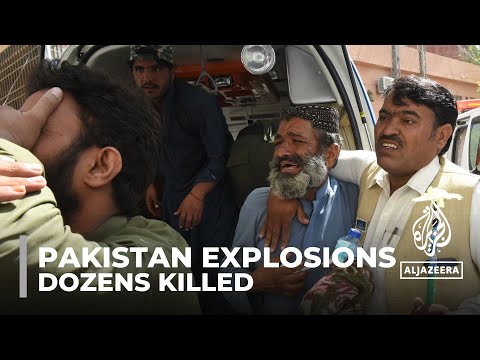 Pakistan explosions: dozens killed in two blasts