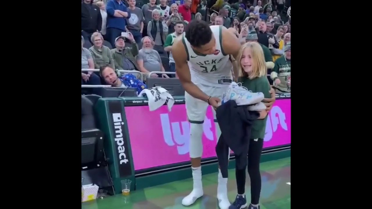 giannis antetokounmpo giving shoes