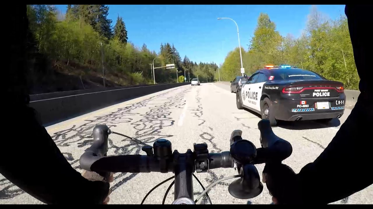 Cop pulls over driver into bike lane in Port Moody, Canada 02/05/2024 ...