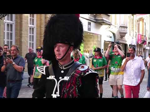 Marching up to the Menin Gate. Ypres. Belgium. 9th July 2022