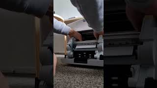 How to change print paper DNP RX1