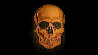 Carving a skull on leather