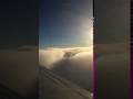 Flying over the clouds in a Mooney M20F
