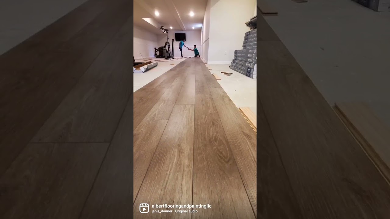 installation of beautiful coretec vinyl flooring.  Albert's Flooring &Painting LLC