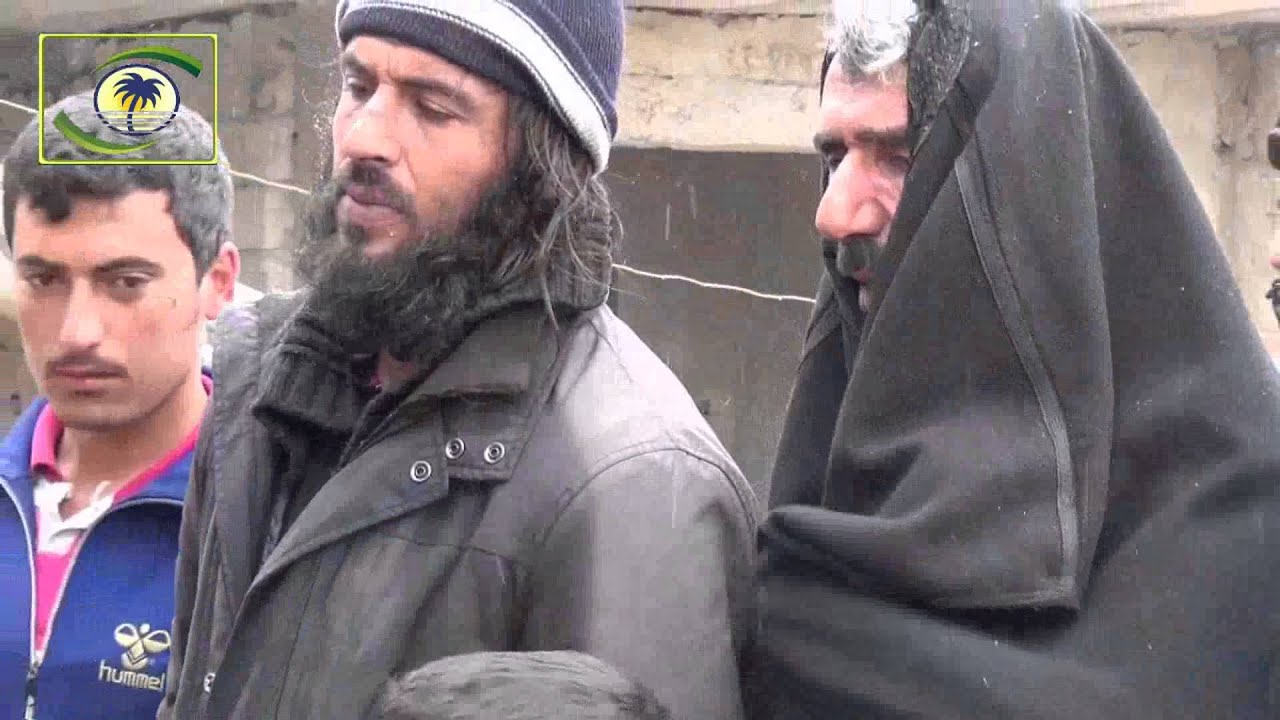 منادي الخير - 1504020 - توزيع الخبزفي بلدة الموزرة - ادلب - سوريا 31-12-2015