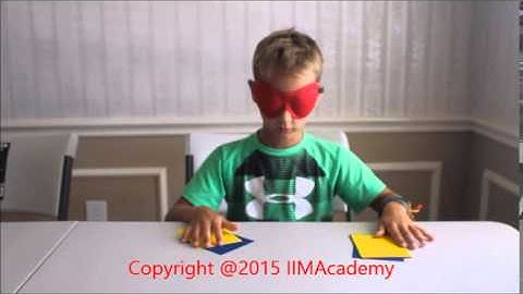 Child identifying colors blindfolded with just 2 days training