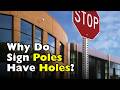 Why Do Street Signs Have Holes Punched Throughout the Pole?