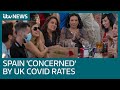 Some Spaniards 'slightly concerned' by UK Covid-19 rates as tourists return | ITV News