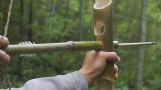 How to make a bamboo bow with a long arrow rest tube and shooting eagle.