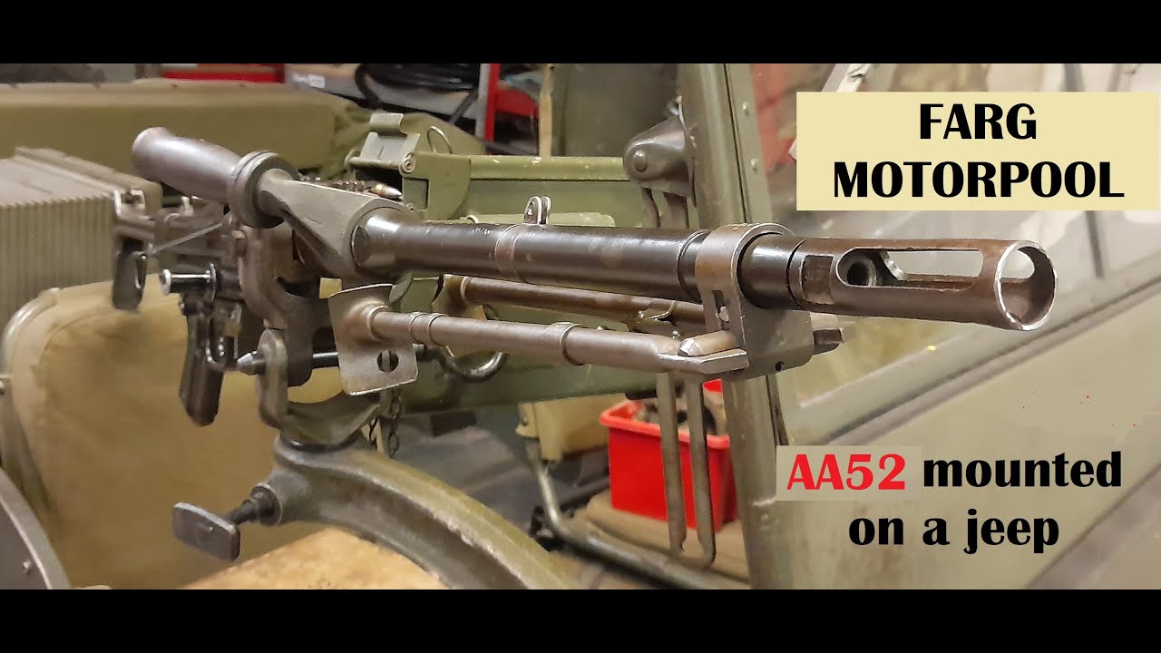 The AA52 machine gun, mounting on tripod and a Hotchkiss M201 Jeep