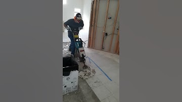 Busting up stubborn OLD tile flooring with large jack hammer chisel! how 2 home remodeling
