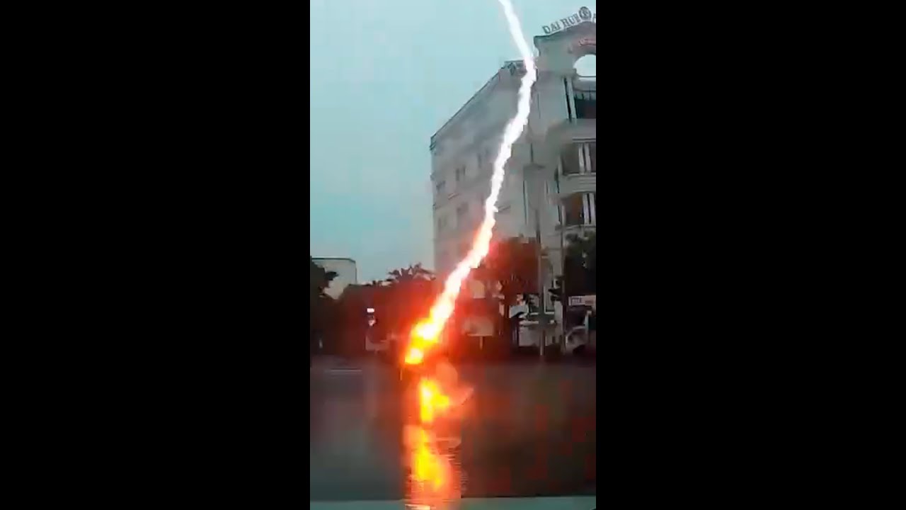 Motorcycle rider struck by lightning in Vietnam Motorcycle rider struck by lightning in Vietnam