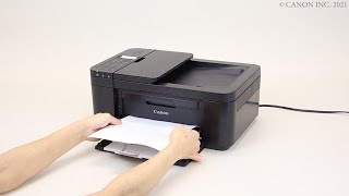 Removing jammed paper: paper output slot