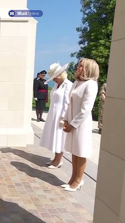 Awkward moment Brigitte Macron breaks Royal protocol as she tries to hold Queen Camilla's hand