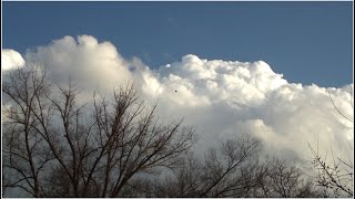 Sky Father, Earth Mother - magnificent clouds and moving water - reflection.