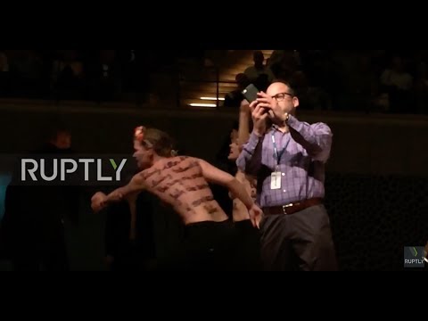 Germany: Topless FEMEN activists crash Woody Allen concert in Hamburg *EXPLICIT*