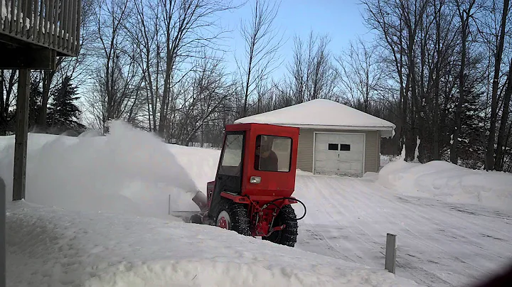 Ingersoll 448 garden tractor repowered with 27 hp Generac blowing snow snowblower