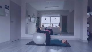 Two easy abdominal pilates exercises using the fit ball and a soft ball. screenshot 5