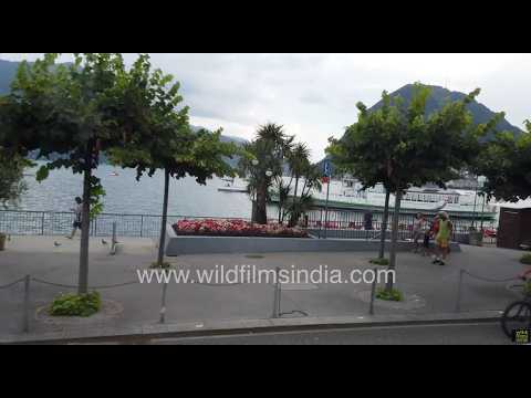 Roadside view of Lake Lugano promenade and Cassarate River in Lugano, Ticino, Switzerland
