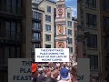 Over 100 men carry a 4-ton Giglio statue in Williamsburg