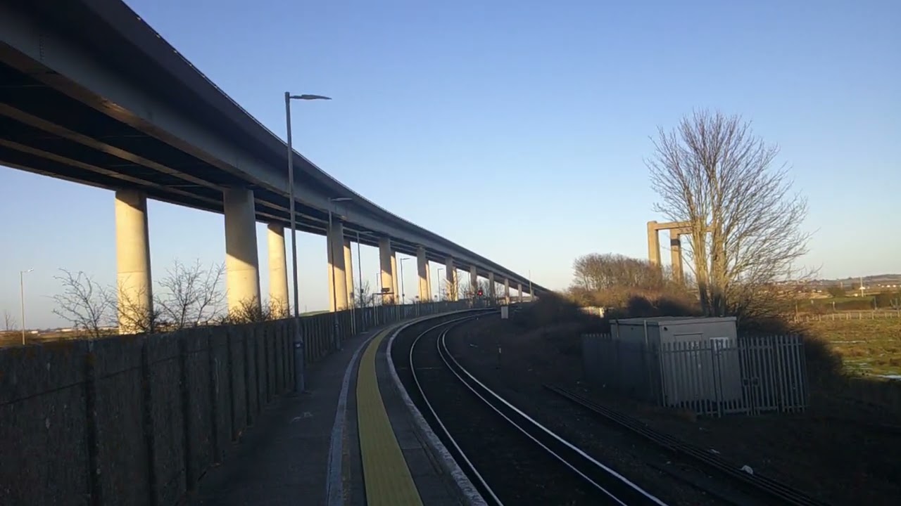 Garg and a train passing through Swale station
