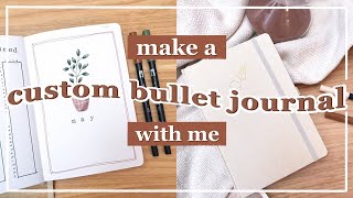 make a custom bullet journal with me! day 1 | plan with me | custom bullet journal setup screenshot 4