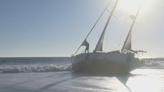 Still Stranded: Man has three weeks to move sailboat off Jacksonville Beach