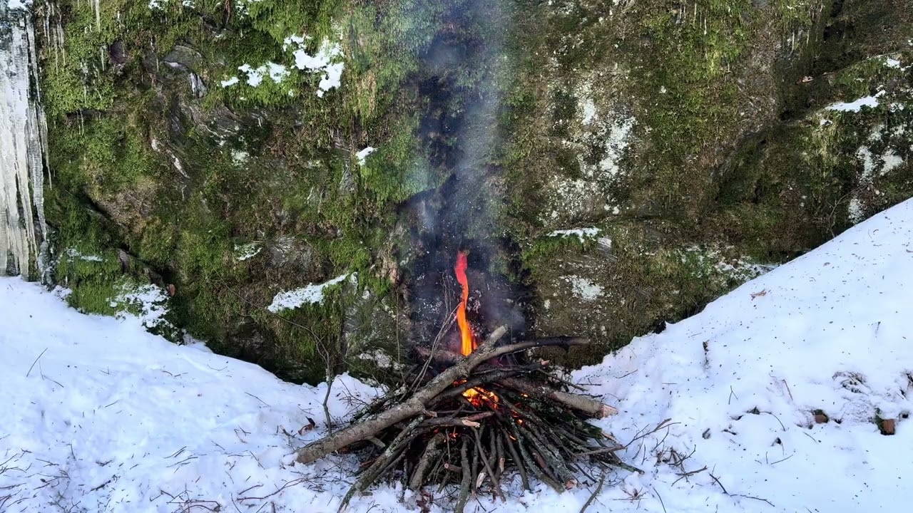 A crackling fire in the winter woods. Birch bark tinder, and eastern hemlock. 