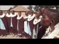 A Tanzanian Maasai tribe's singing and jumping dance in their boma