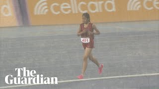 Hitting the squall: Cambodian runner refuses to quit race despite huge storm