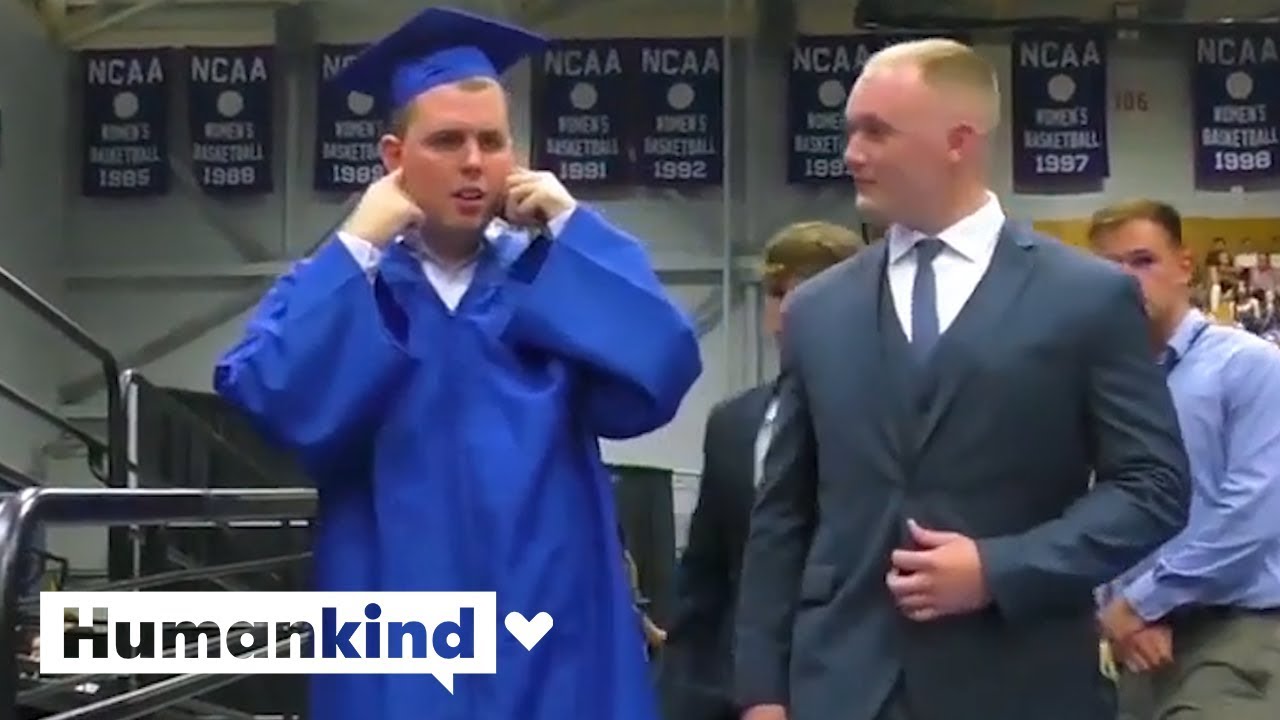 Auditorium goes silent so autistic student can accept diploma | Humankind