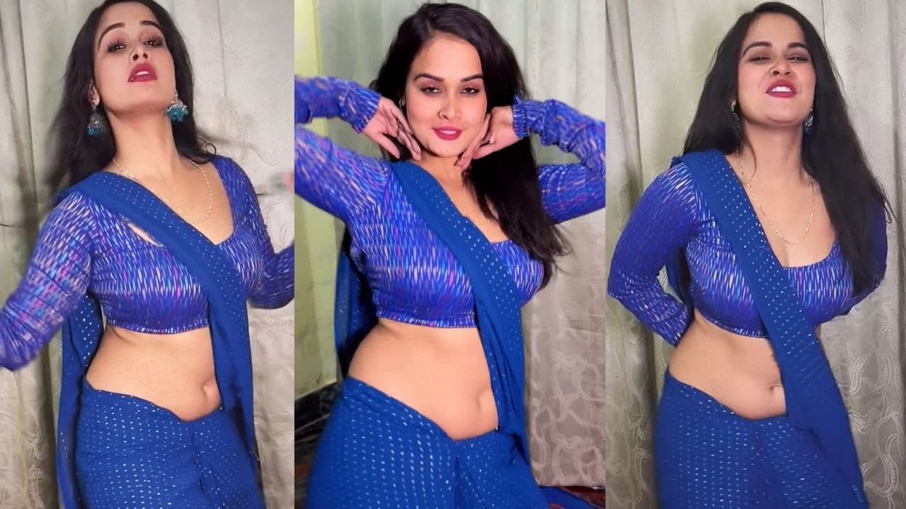 Low hip saree draping style with Blue Glitter Saree Paired With Blue Full Hand Blouse