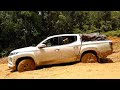 Mitsubishi Triton and Mitsubishi Strada L200 In Deep Mud Puddle - 4x4 Pickup Truck In Mud Route