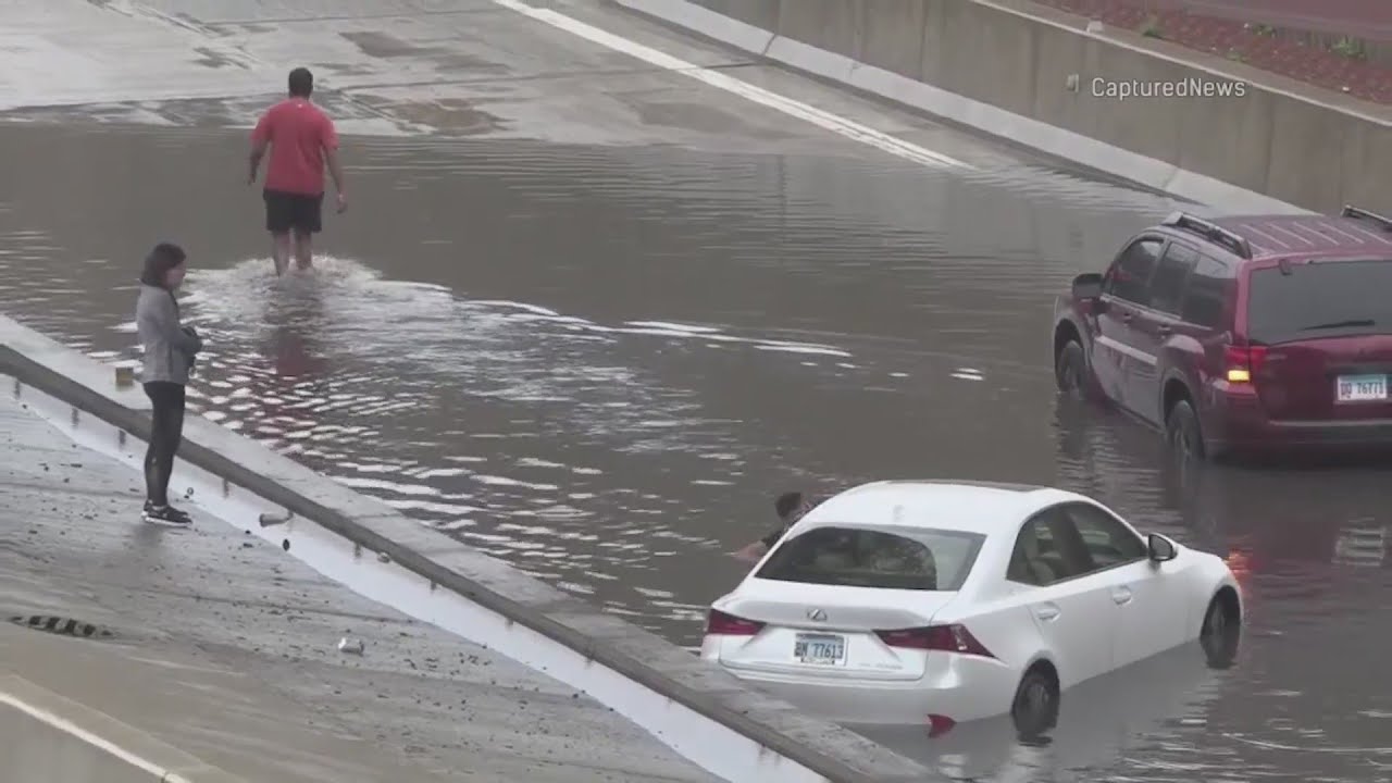Flash Flooding in viaducts strands motorists across Chicago - YouTube