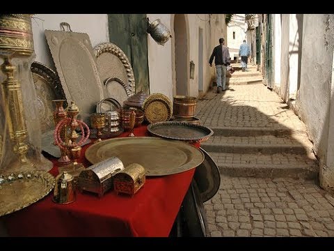 نقره لتكبير أو تصغير الصورة ونقرتين لعرض الصورة في صفحة مستقلة بحجمها الطبيعي