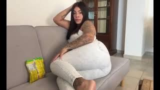 Girl Farting white jeans on sofa