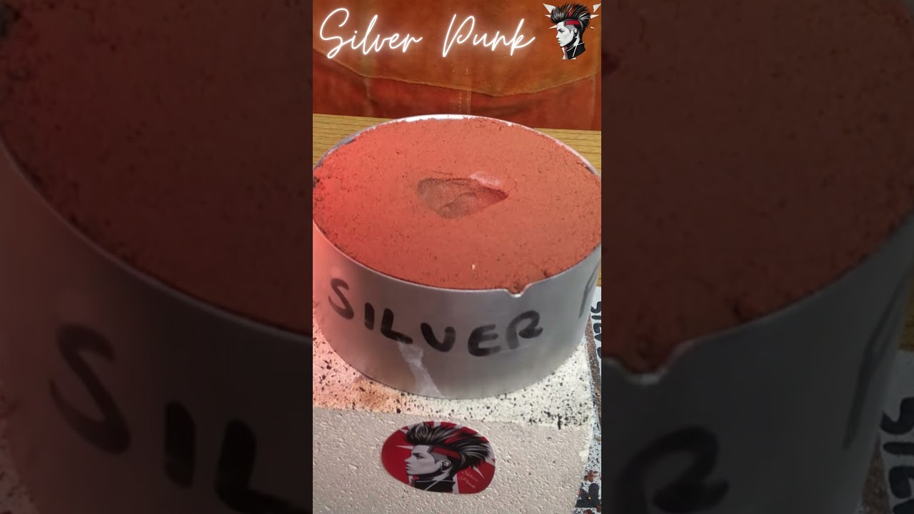 Hand poured MOLTEN SILVER into a MOON ROCK