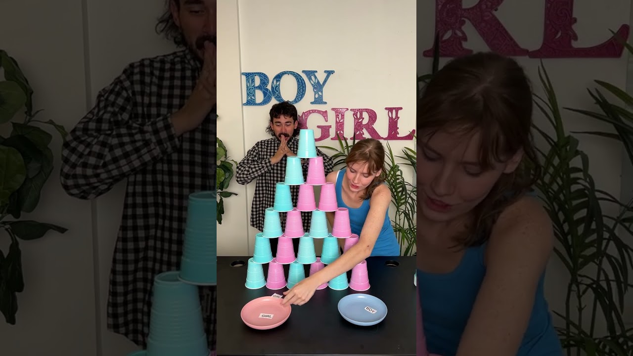 Parents turn cup stacking into gender reveal game! #shorts