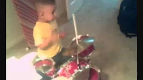 Andrew Berumen playing drums - 1 year old