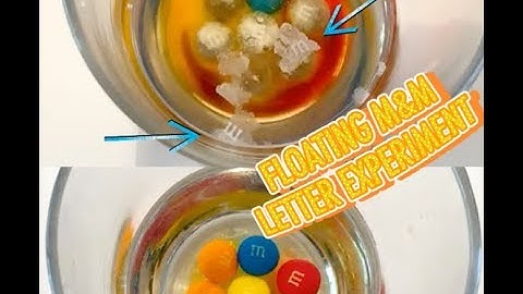 Floating Letter M with M and M candy Experiment