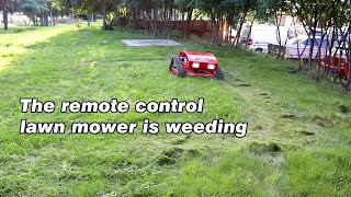 The remote control lawn mower is weeding