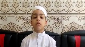 المشارك محمد معمو من مدينة الريش في مسابقة تجويد القرآن الكريم