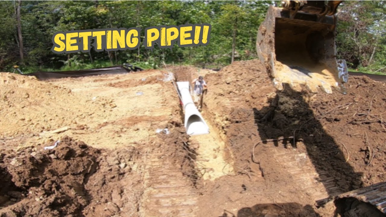 Laying pipe crossings on the greenway - YouTube