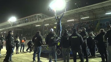 Matt Sheppard gets out of his car in victory lane Oct 9 2022