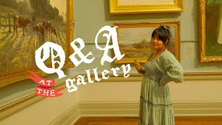 answering your qs at the art gallery