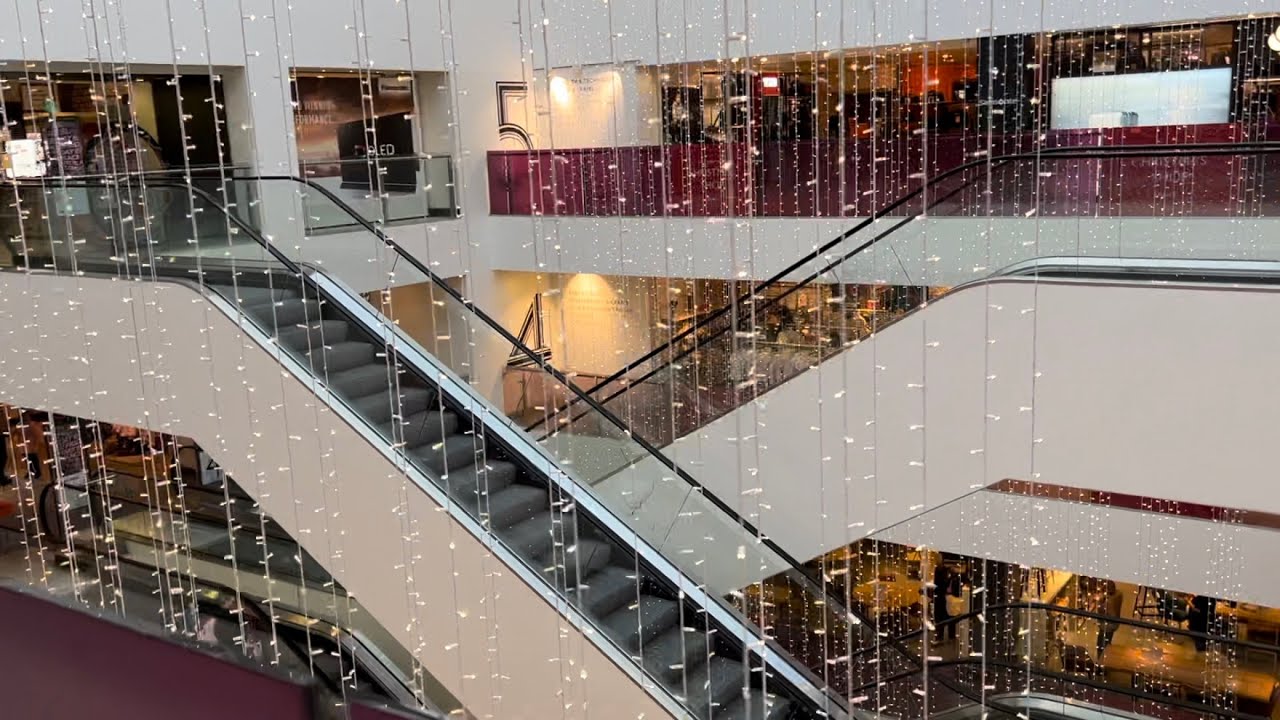 London, England. 5x KONE Escalator up ride at John Lewis Oxford Street Department store - rear set