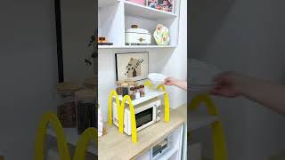 The countertop is cluttered and messy, making the kitchen look small! Utilize vertical space to expa